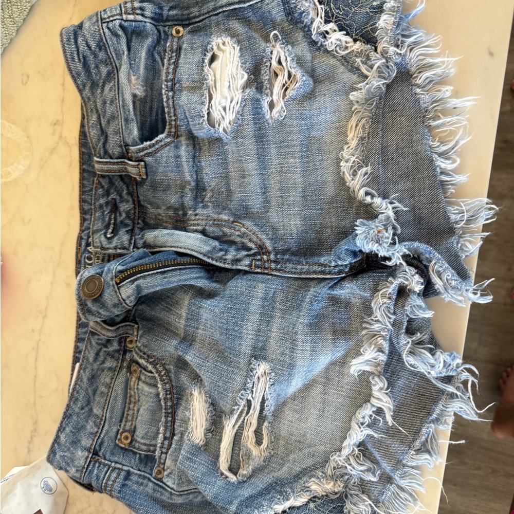 American Eagle Outfitters Light Blue Distressed Jean Shorts